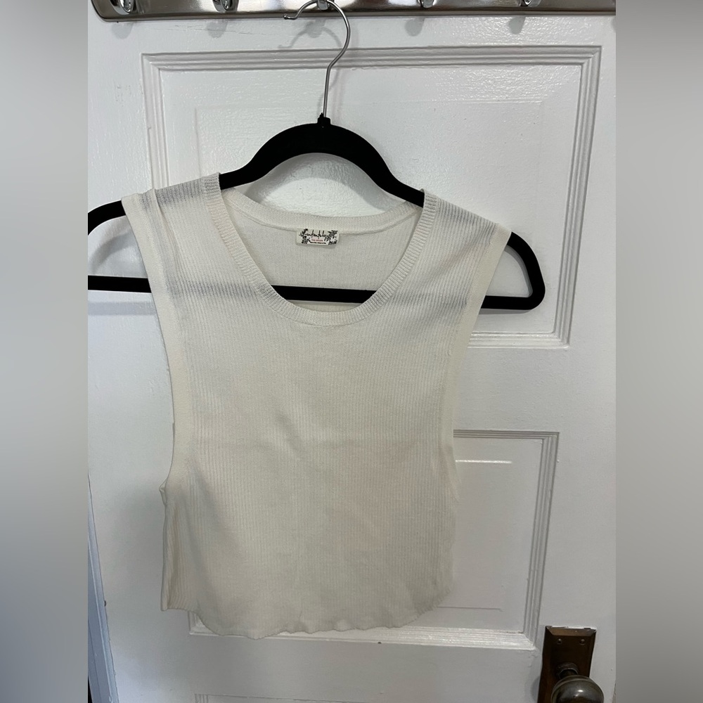 Free people crop top. Nice knit ribbed fabric. Semi sheer.